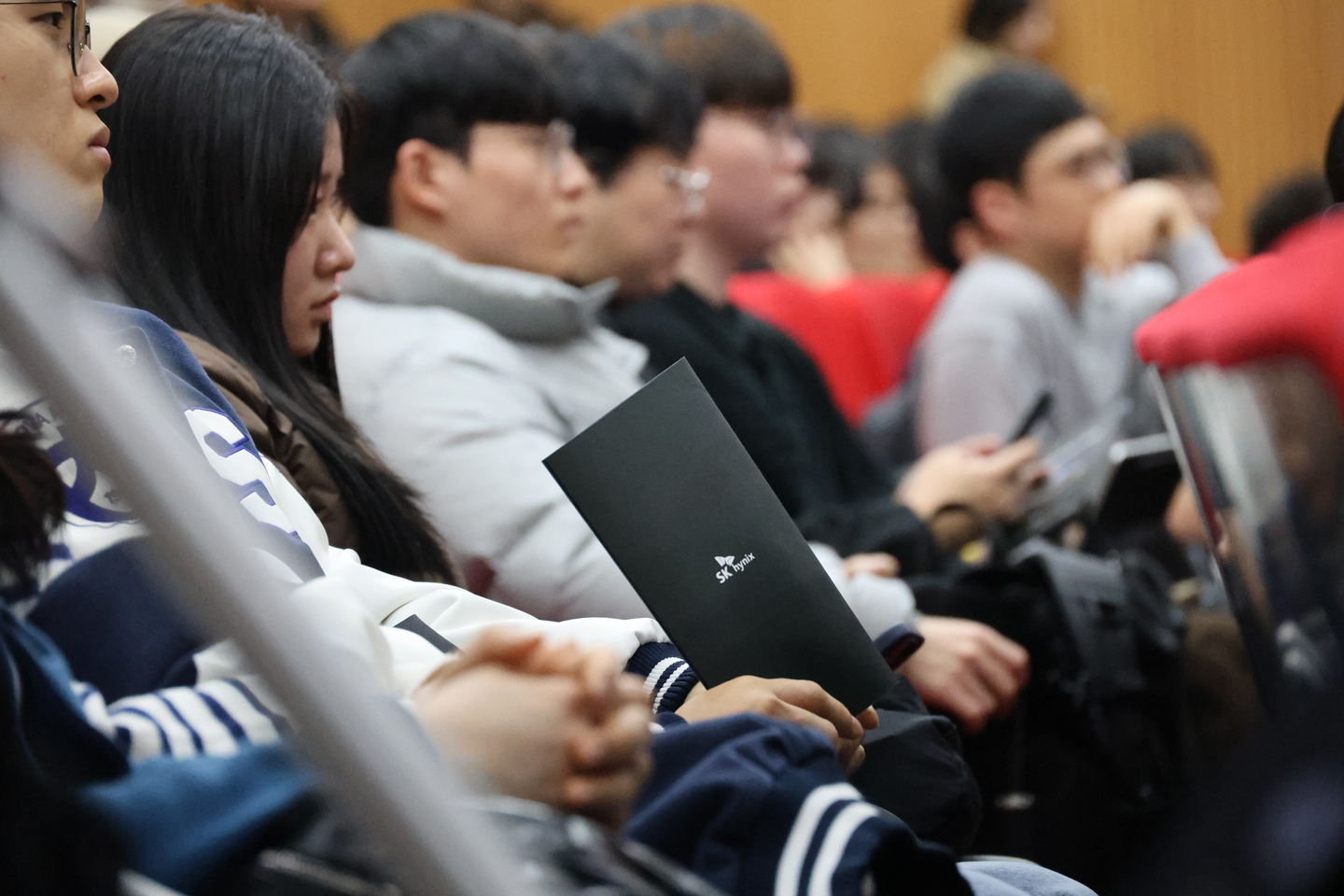 Job seekers participate in a presentation hosted by SK hynix Inc. at Chungbuk National University in the central city of Cheongju on March 9, 2026. [YONHAP] 