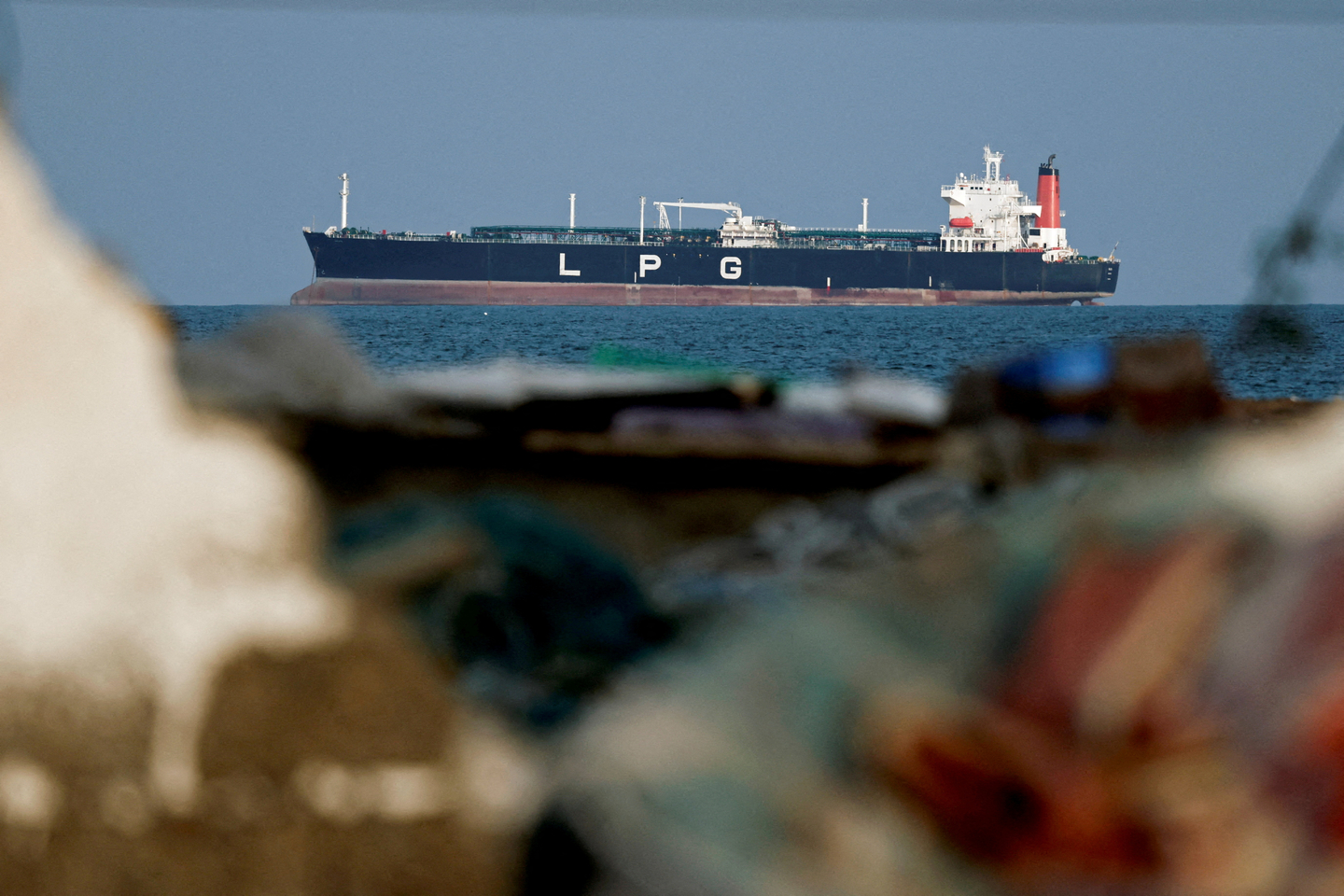 An LPG gas tanker at anchor as traffic is down in the Strait of Hormuz, amid the U.S.-Israeli conflict with Iran, in Shinas, Oman, March 11, 2026. [REUTERS/YONHAP]