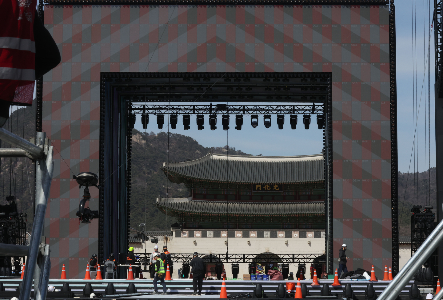 Preparations are underway at Gwanghwamun Square in central Seoul on March 19 for BTS’s upcoming performance on March 21. [JOINT PRESS CORPS]