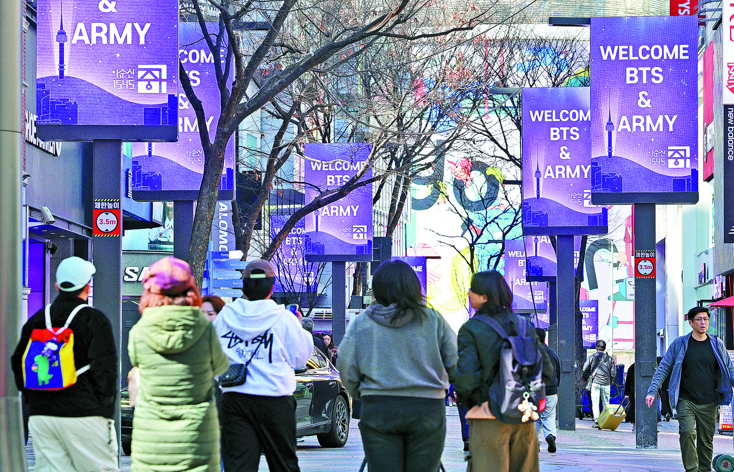 Messages and banners welcoming ARMY, boy band BTS's fans, are seen around Myeongdong in central Seoul on March 19. [NEWS1]
