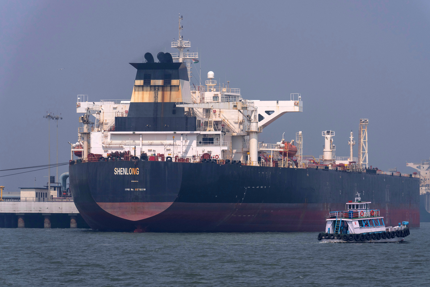 A tanker carrying crude oil from Saudi Arabia, that arrived clearing the Strait of Hormuz, is seen at the Mumbai Port in Mumbai, India on March 12. [AP]