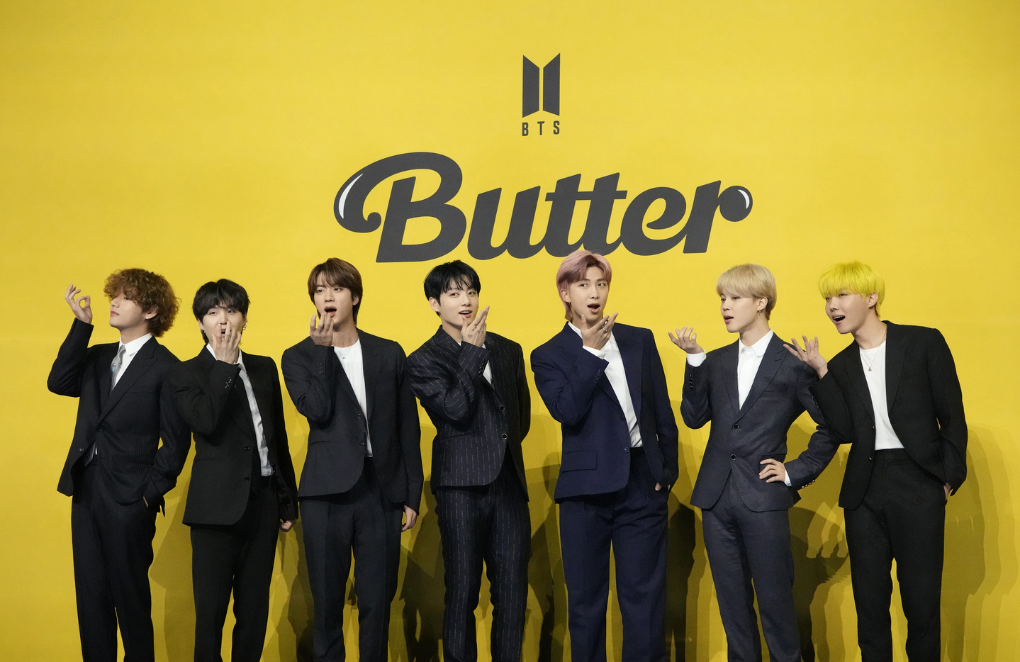 BTS members pose for photos ahead of a press conference to introduce their new single ″Butter″ in Seoul on May 21, 2021. [AP/YONHAP] 