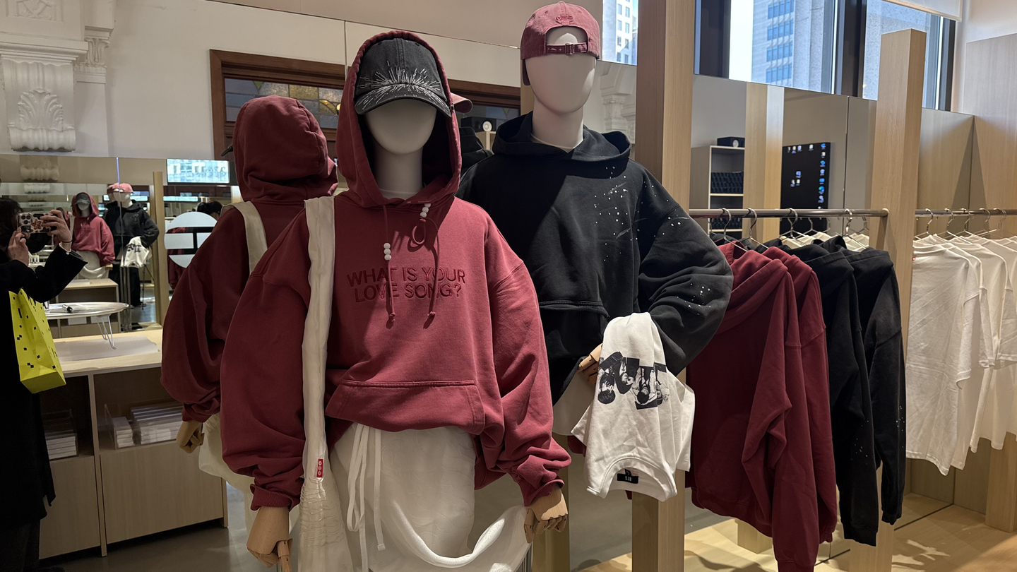 Hoodies and t-shirts for sale at the BTS pop-up store on the fourth floor of The Heritage at Shinsegae The Main in Jung District, central Seoul. [WOO JI-WON]