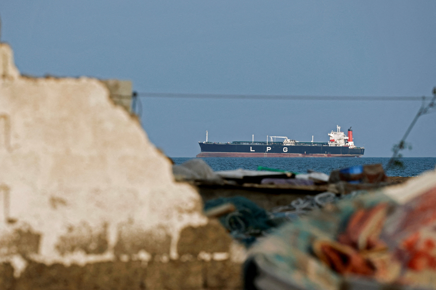 An LPG gas tanker at anchor as traffic is down in the Strait of Hormuz, amid the U.S.-Israeli conflict with Iran, in Shinas, Oman, on March 11. [REUTERS/YONHAP]