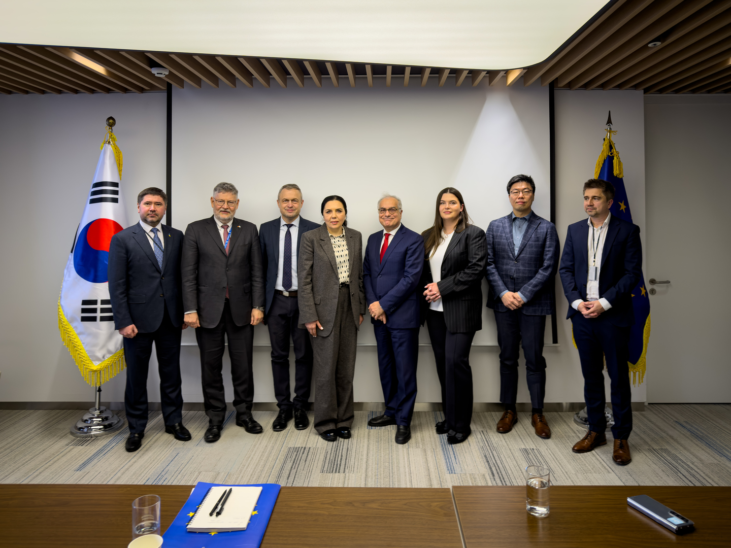 From left: Andrii Vieshkin, Ukrainian charge d’affaires in Seoul; Jorn Beissert, German deputy head of mission in Seoul; Mykhailo Samus, director of the New Geopolitics Research Network; Nataliya Butyrska, senior fellow at the New Europe Center; Ugo Astuto, ambassador of the European Union to Korea; moderator Krystyna Zeleniuk, associate fellow at the New Europe Center; Go Myong-Hyun, senior research fellow at the Asan Institute for Policy Studies; and Frederic Spohr, Head of the Friedrich Naumann Offices in Korea and Taiwan, pose for a group photo at the offices of the EU delegation in central Seoul after their panel discussion on the global instability resulting from Russia's war against Ukraine and its implications for the Korean Peninsula on March 20. [MICHAEL LEE]