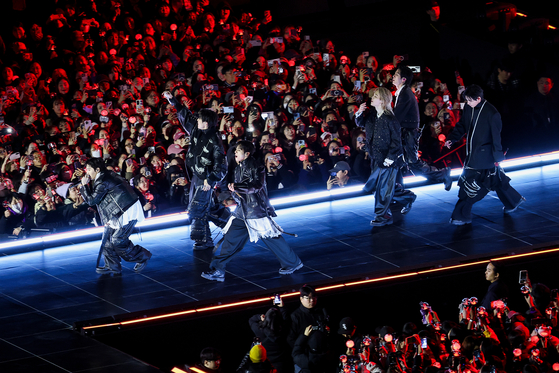 Boy band BTS performs on stage during its performance, titled ″BTS The Comeback Live: Arirang,″ at Gwanghwamun Square in central Seoul on March 21. [AP/YONHAP] 