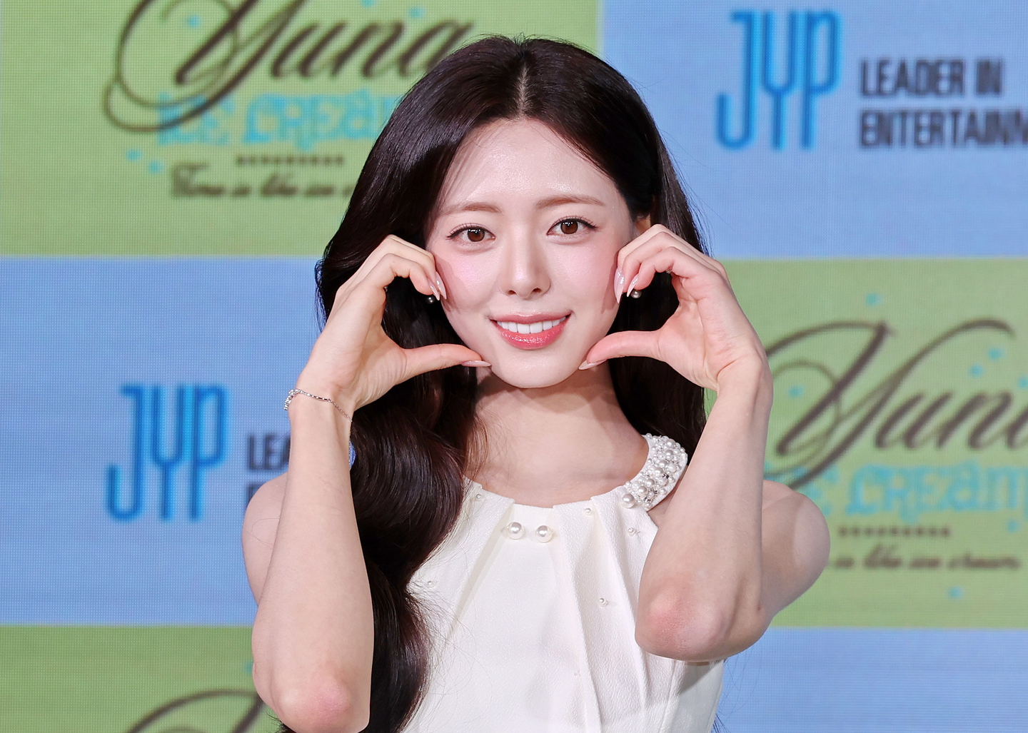 Yuna of girl group ITZY poses for photos during a press conference for her solo debut EP, ″Ice Cream,″ at Pullman Ambassador Seoul Eastpole hotel in eastern Seoul on March 23. [YONHAP]