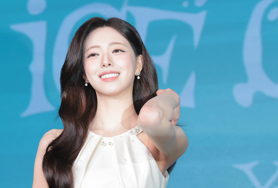 Yuna of girl group ITZY poses for photos during a press conference for her solo debut EP, ″Ice Cream,″ at Pullman Ambassador Seoul Eastpole hotel in eastern Seoul on March 23. [NEWS1]