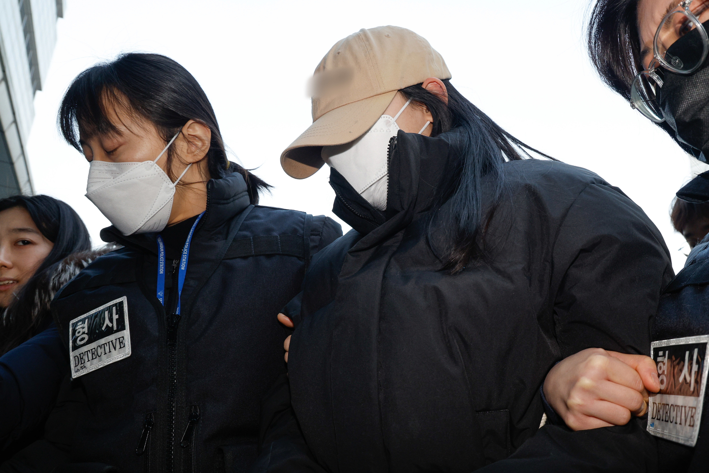 A woman accused of fatally poisoning victims' drinks appears for a pretrial detention hearing at the Seoul Northern District Court in Dobong District, northern Seoul, on Feb. 12. [NEWS1]