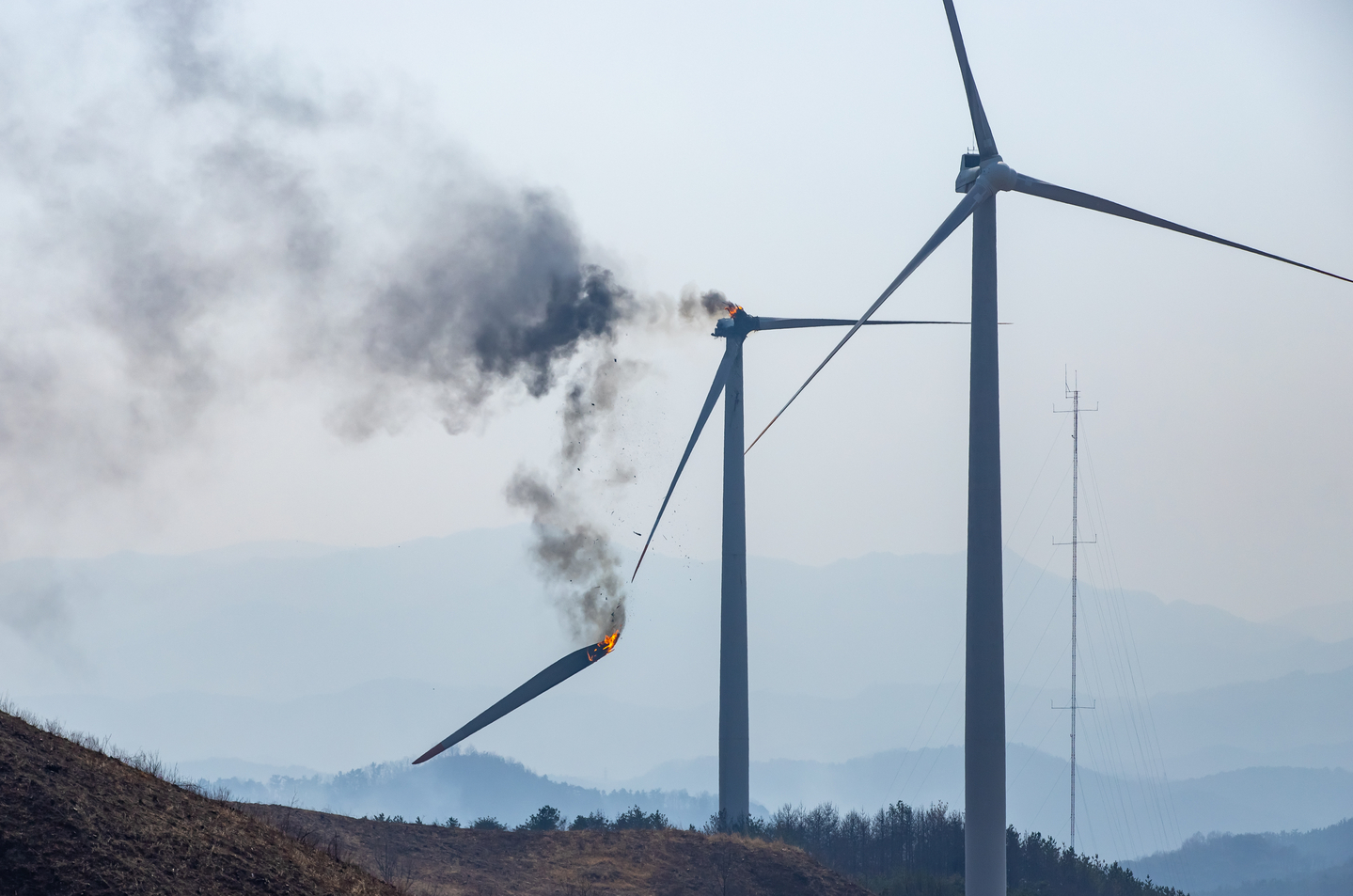 A wind turbine is on fire at a wind farm in Yeongdeok County, North Gyeongsang, on March 23. [YONHAP]