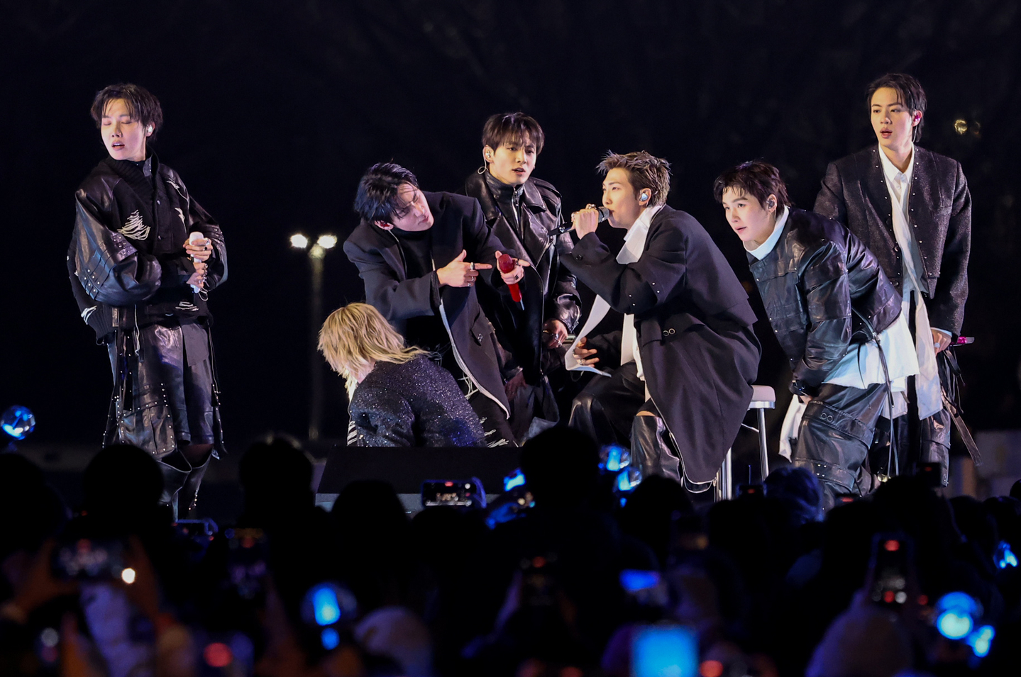 BTS performs onstage during its comeback show, "BTS The Comeback Live: Arirang," at Gwanghwamun Square in Jongno District, central Seoul, on March 21.[YONHAP]