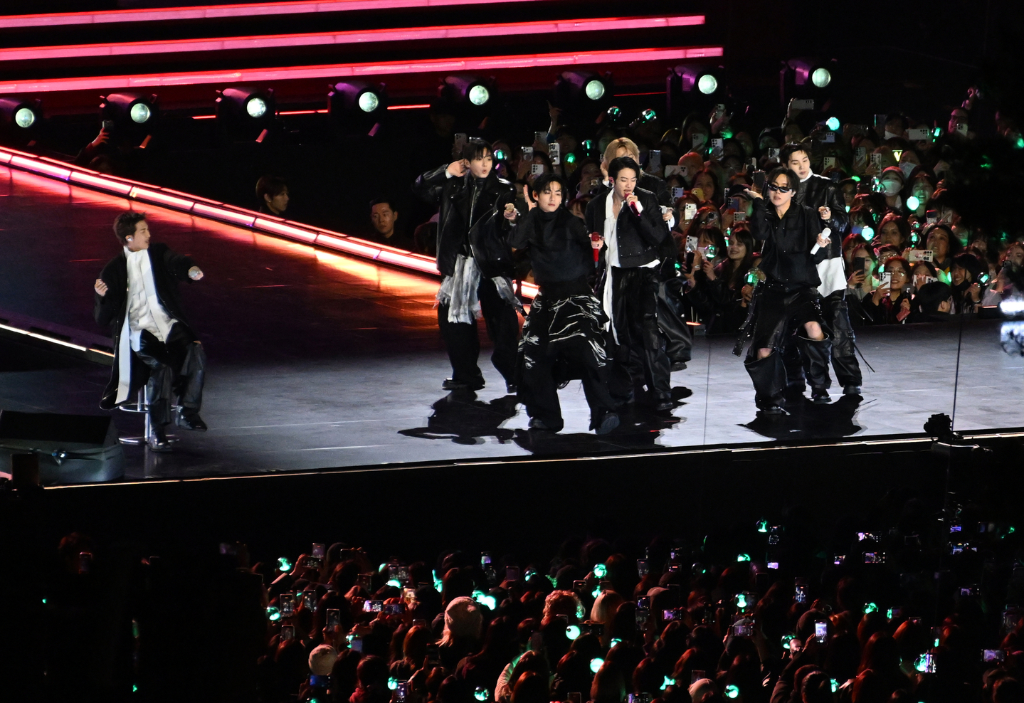 K-pop band BTS performs onstage during its comeback concert at Gwanghwamun Square, Jongno District, central Seoul, on March 21. [AP/YONHAP]