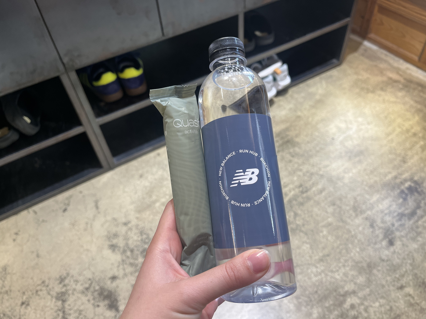 The cold towel and bottle of water I was given at the New Balance Bukchon store after completing my run in Jongno District, Seoul, on March 17.  [ALICIA CARR]