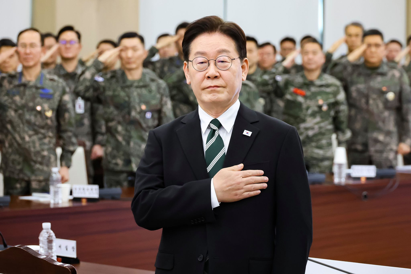 President Lee Jae Myung takes part in the national ceremony at a meeting of key military commanders at the Ministry of National Defense in Yongsan District, central Seoul, on March 27. [JOINT PRESS CORPS]