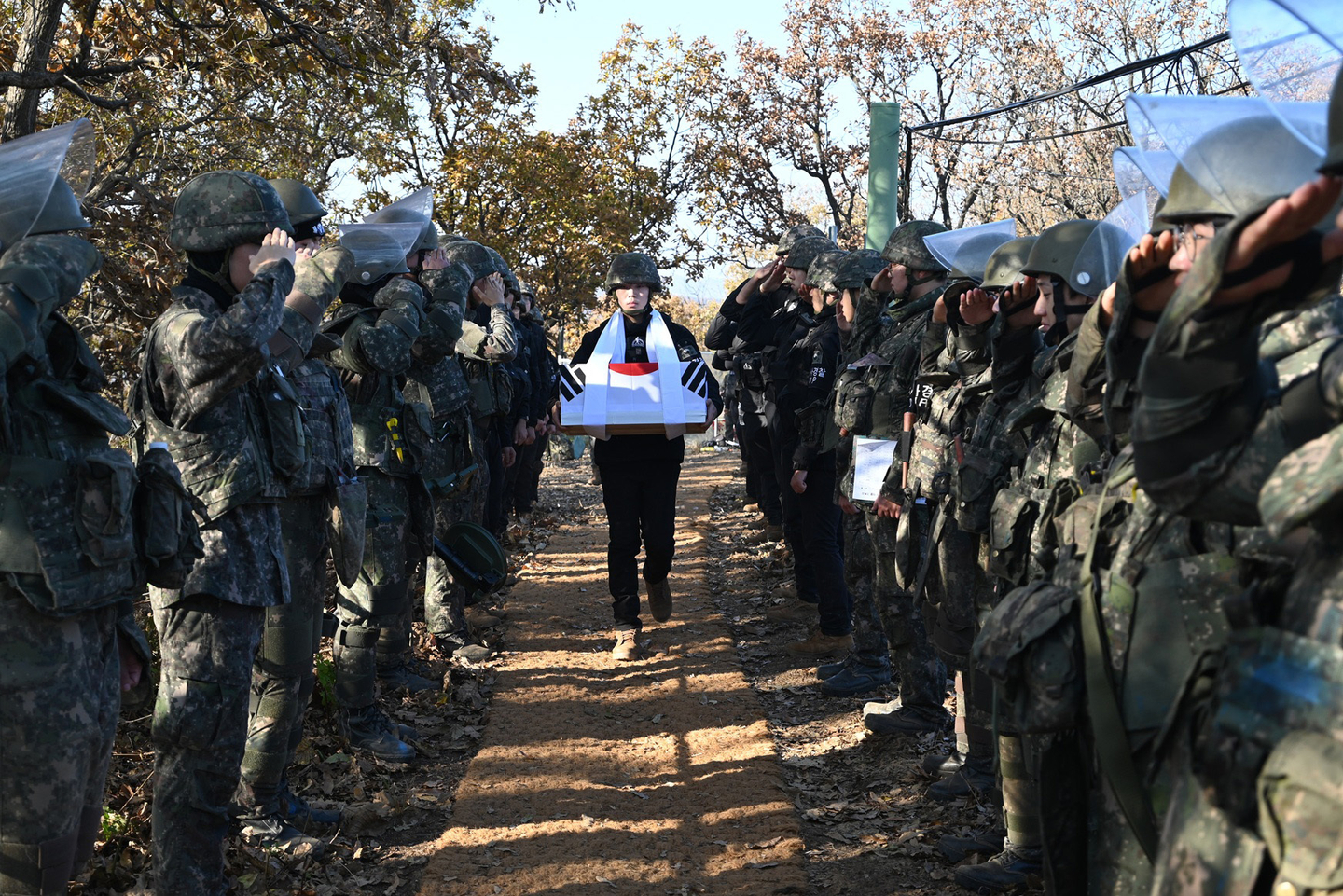 Soldiers send off the remains of 25 soldiers killed in the 1950-53 Korean War, found at the White Horse Ridge in Cheorwon, Gangwon, in this photo provided by the Ministry of National Defense on Dec. 1, 2025. [MINISTRY OF NATIONAL DEFENSE]