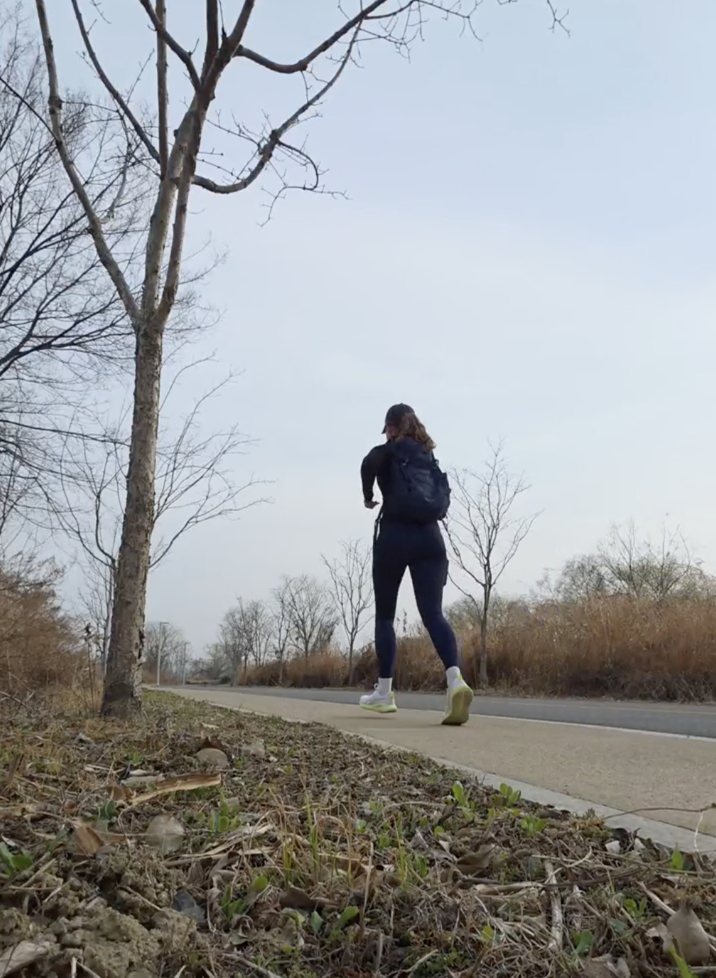 I run along a trail by the Han River in Mapo Dstrict, western Seoul, on March 24. [ALICIA CARR]