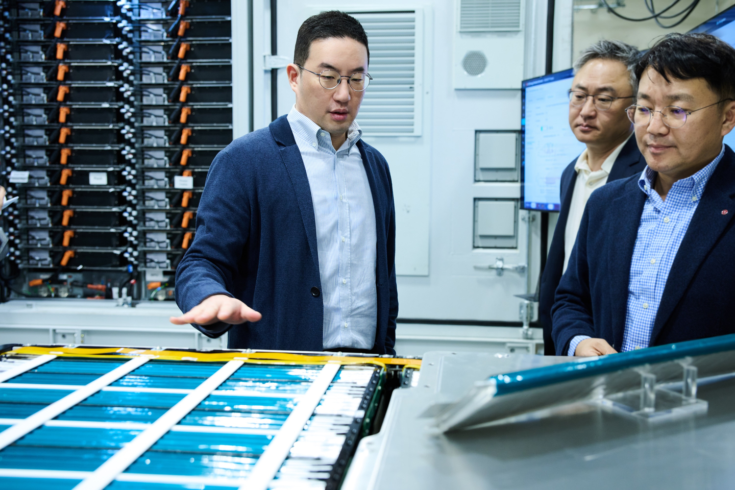 LG Chairman Koo Kwang-mo, left, inspects pouch-type battery cells used in energy storage system (ESS) battery packs at Vertech, LG Energy Solution's North American ESS system integration subsidiary, on March 30. [LG]