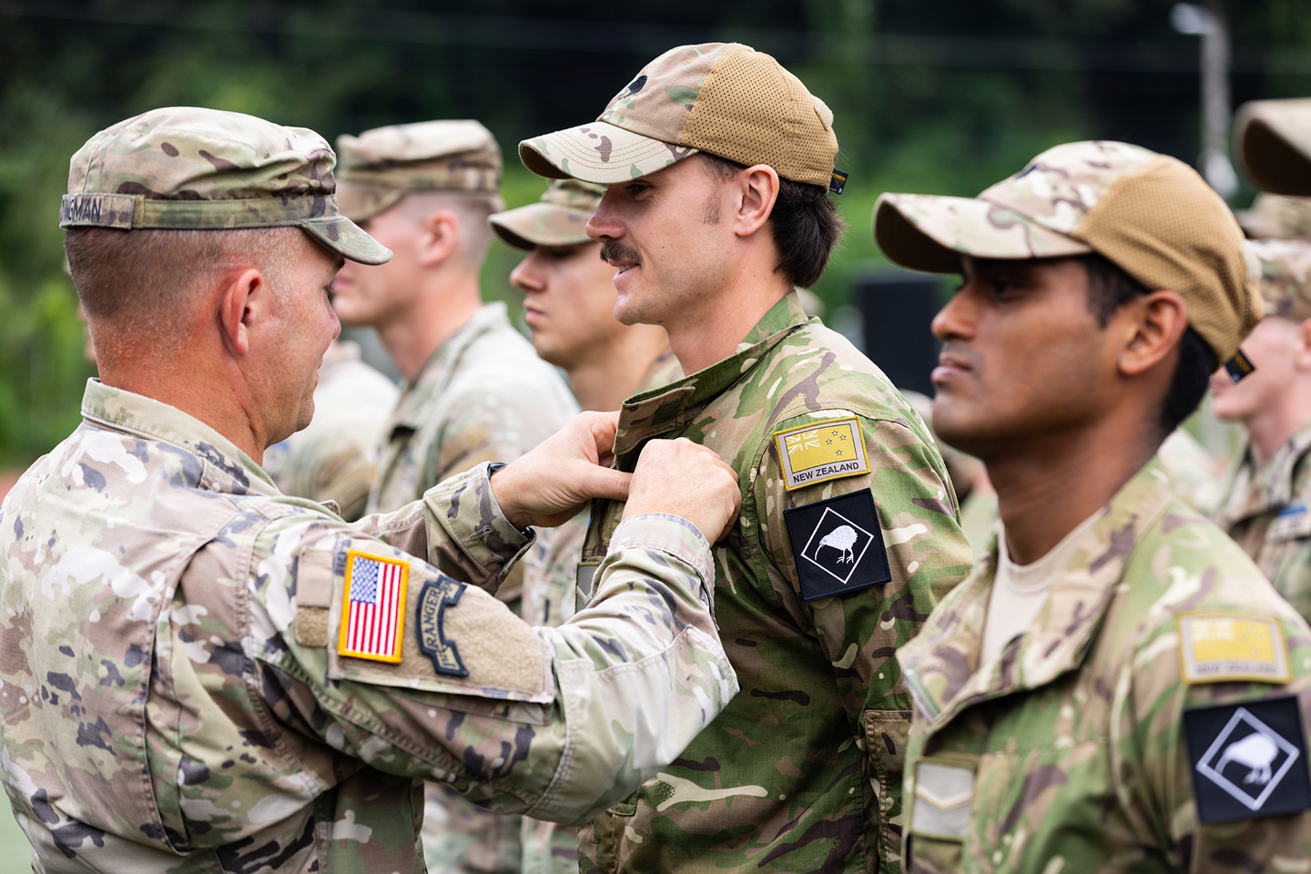 Members of the infantry platoon are awarded the U.S. Army’s Elite infantryman Badge during last year’s first rotation in this photo from 2025. [NEW ZEALAND DEFENCE FORCE]