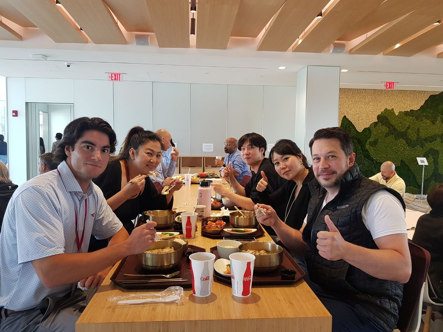 Employees eat Korean food at a U.S. company that uses Ourhome’s food service. [OURHOME]