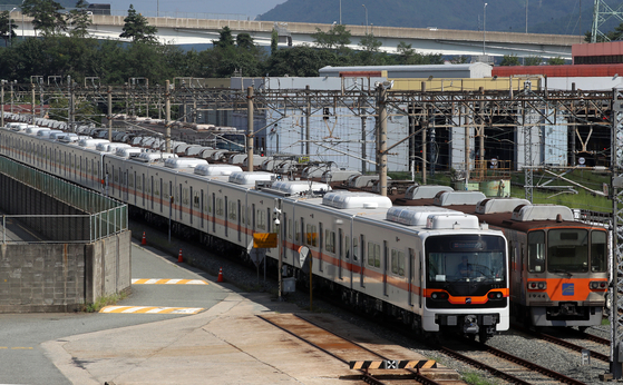 A train waits in a rail yard in Busan on Sept. 16, 2025. [NEWS1] 