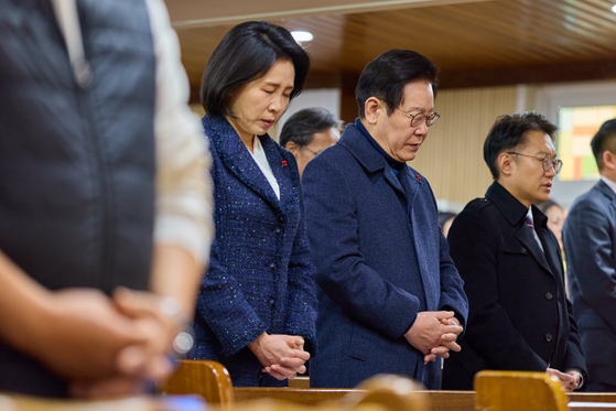 President Lee Jae Myung, second from right, and first lady Kim Hea Kyung attend a Christmas church service in Incheon on Dec. 25, 2025. [BLUE HOUSE]