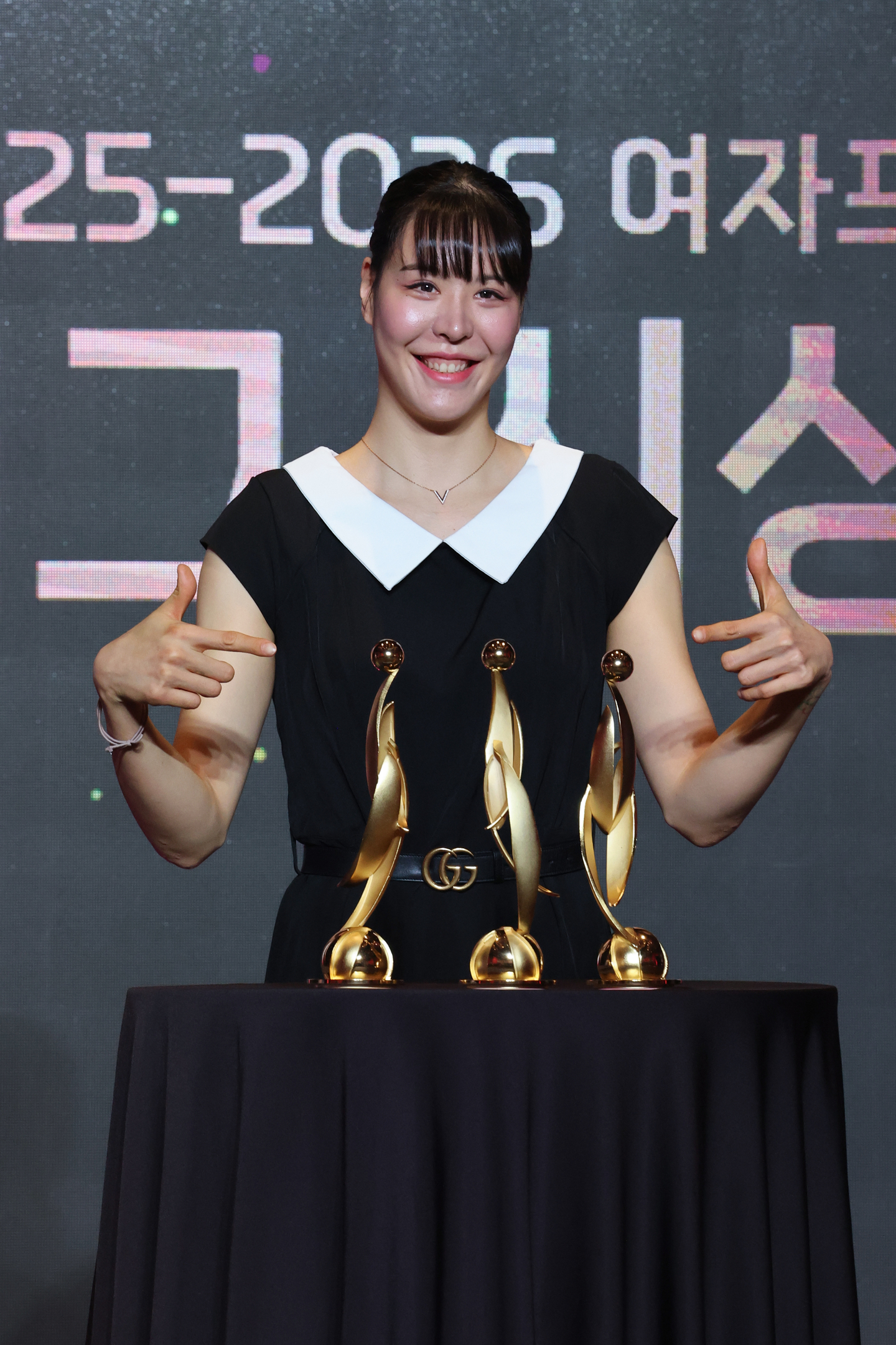 Park Ji-su of the Cheongju KB Stars poses with her trophies after winning three awards ― MVP, Best 5 and the Block Award― at the BNK Financial Group 2025-26 Women’s Korean Basketball League regular-season awards ceremony. [YONHAP]