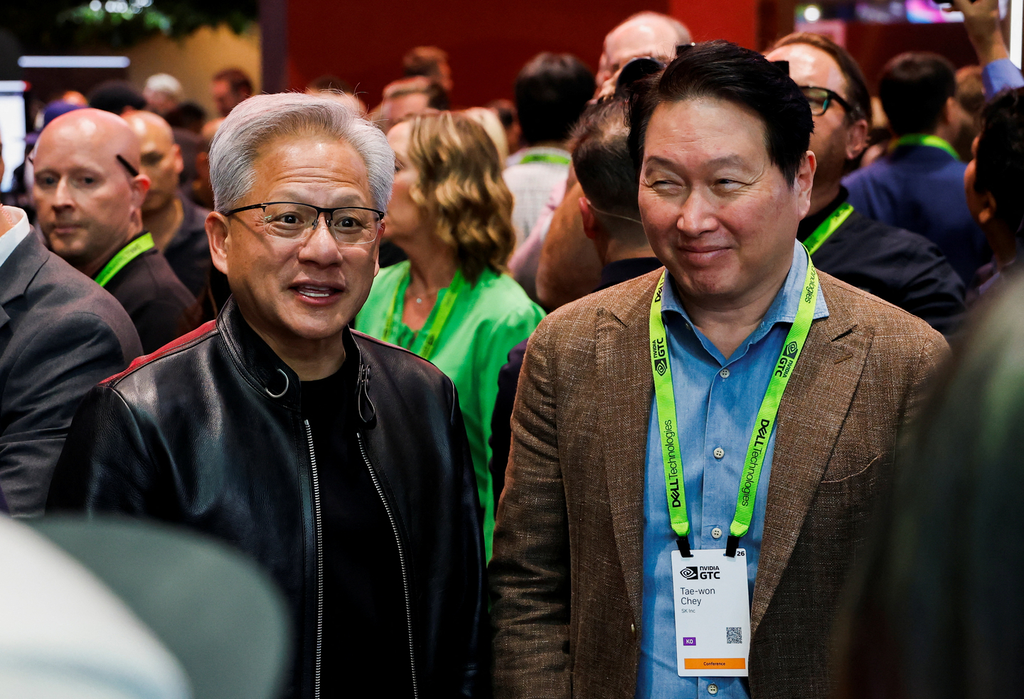 Nvidia CEO Jensen Huang, left, and SK Group Chairman Chey Tae-won attend the Nvidia GTC global AI conference in San Jose, California, on March 16. [REUTERS/YONHAP[