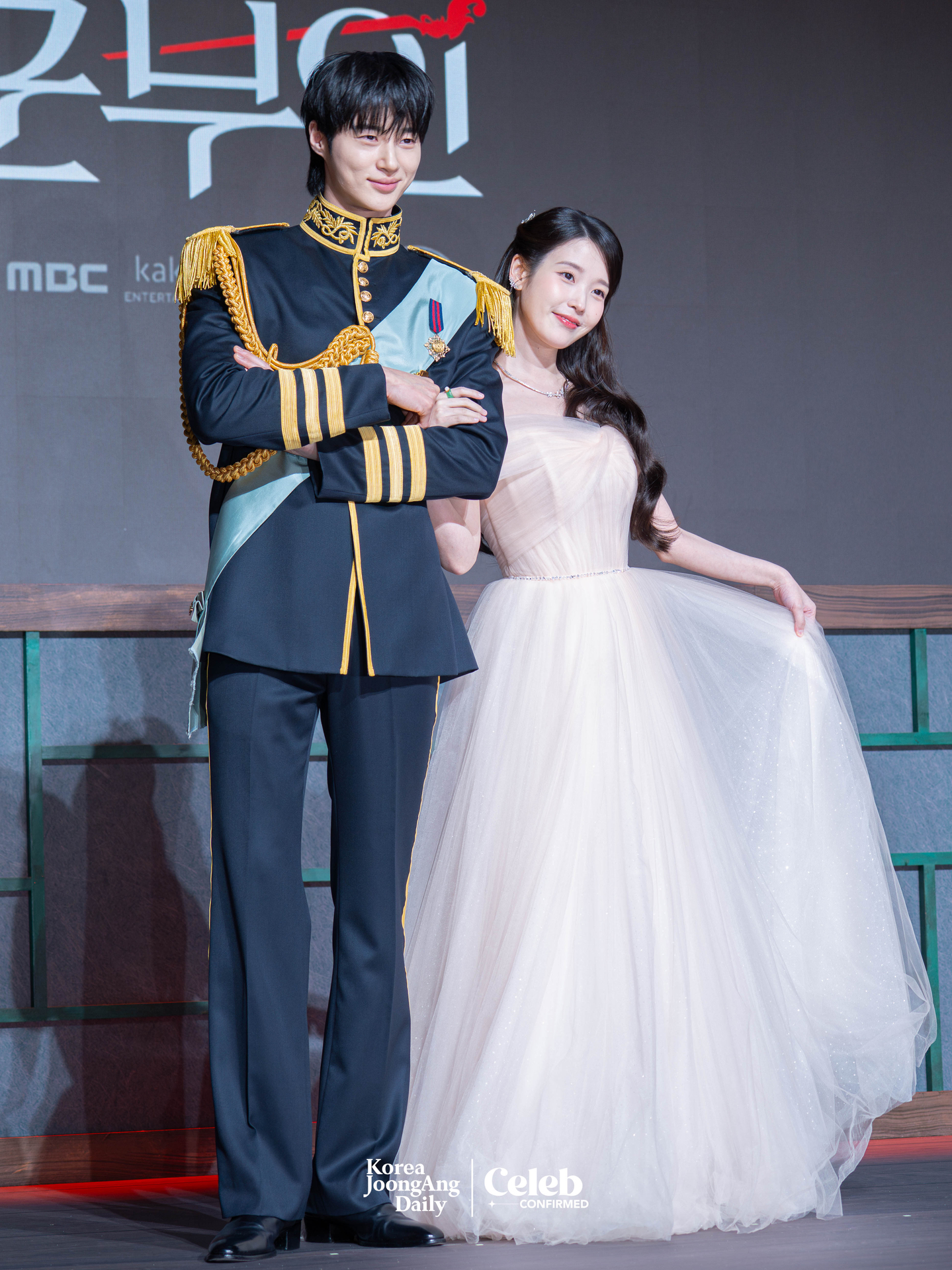 Actors IU and Byeon Woo-seok pose for photos during a press conference for the MBC series “Perfect Crown″ at the Josun Palace Hotel in Gangnam District, southern Seoul, on April 6. [DANIELA GONZALEZ PEREZ]