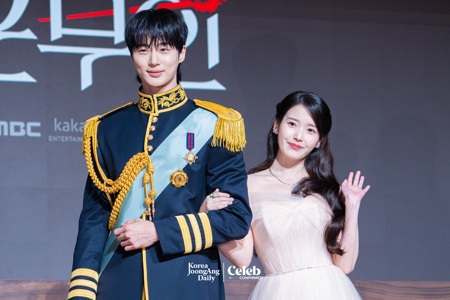 Actors IU and Byeon Woo-seok pose for photos during a press conference for the MBC series “Perfect Crown″ at the Josun Palace Hotel in Gangnam District, southern Seoul, on April 6. [DANIELA GONZALEZ PEREZ]