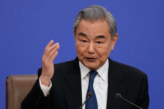 Chinese Foreign Minister Wang Yi speaks during a press conference on the sidelines of the National People's Congress at the media center in Beijing on March 8. [AP/YONHAP]