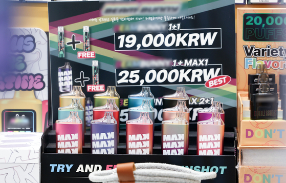 Liquid-type e-cigarettes are displayed at a store in Seoul. [NEWS1]