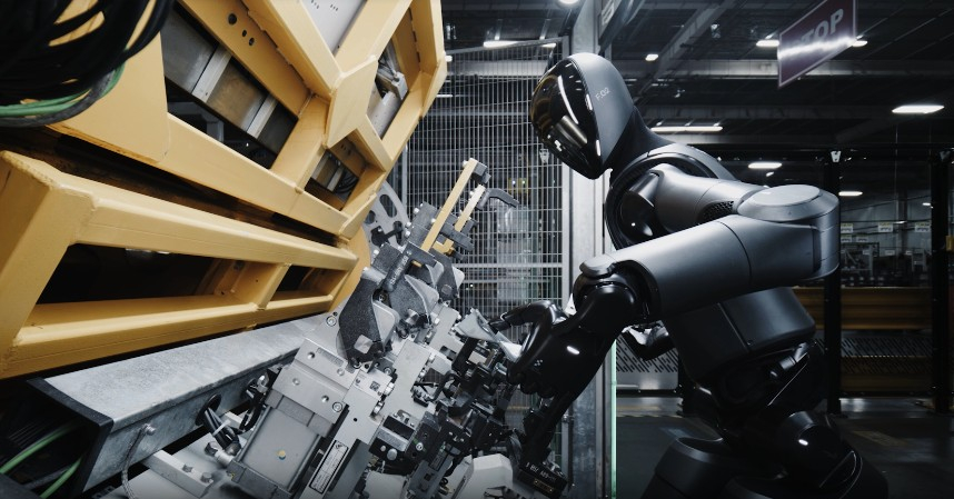 Figure 02, a humanoid robot developed by U.S. robotics firm Figure, is seen working at a BMW factory. Using five-fingered hands, it picks up components and places them into position for assembly. [SCREEN CAPTURE]