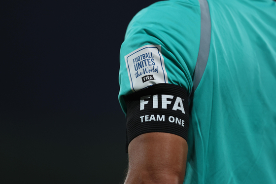 This image provided by FIFA on April 10 shows an armband worn by a match referee. [YONHAP] 