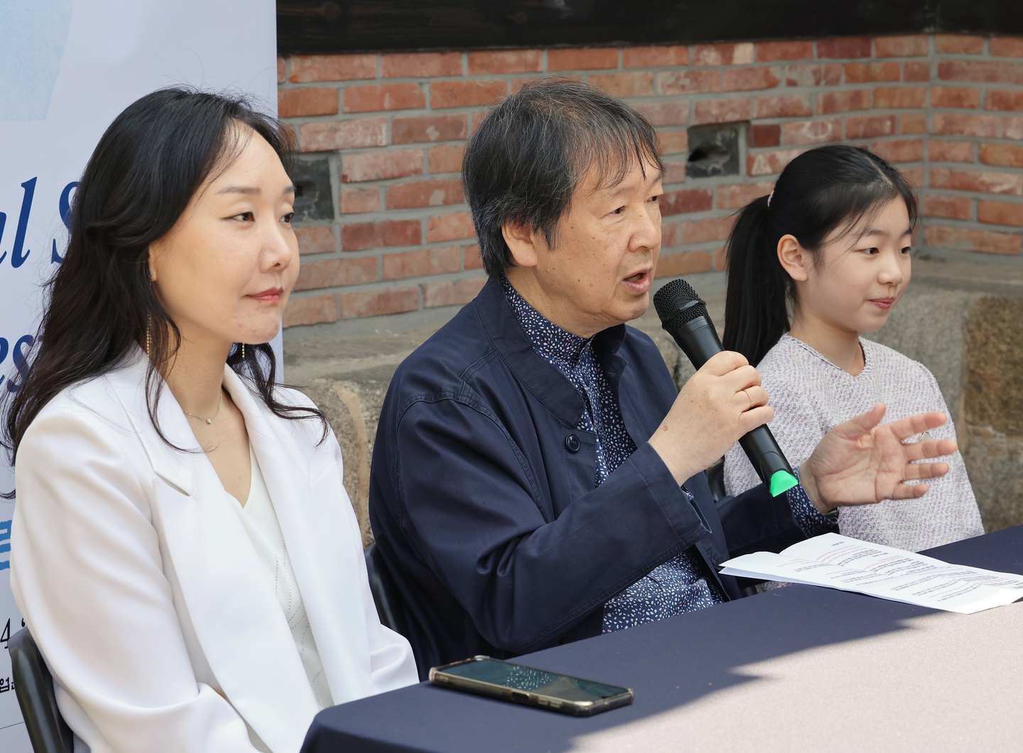 Pianist Lim Hyo-sun, left, Artistic Director of the 2026 Seoul Spring Festival of Chamber Music (SSF) Kang Dong-suk, center, and violinist Kim Yeon-ah attend a press conference for the opening of the SSF at a venue in Jongno District, central Seoul on April 13. [YONHAP]