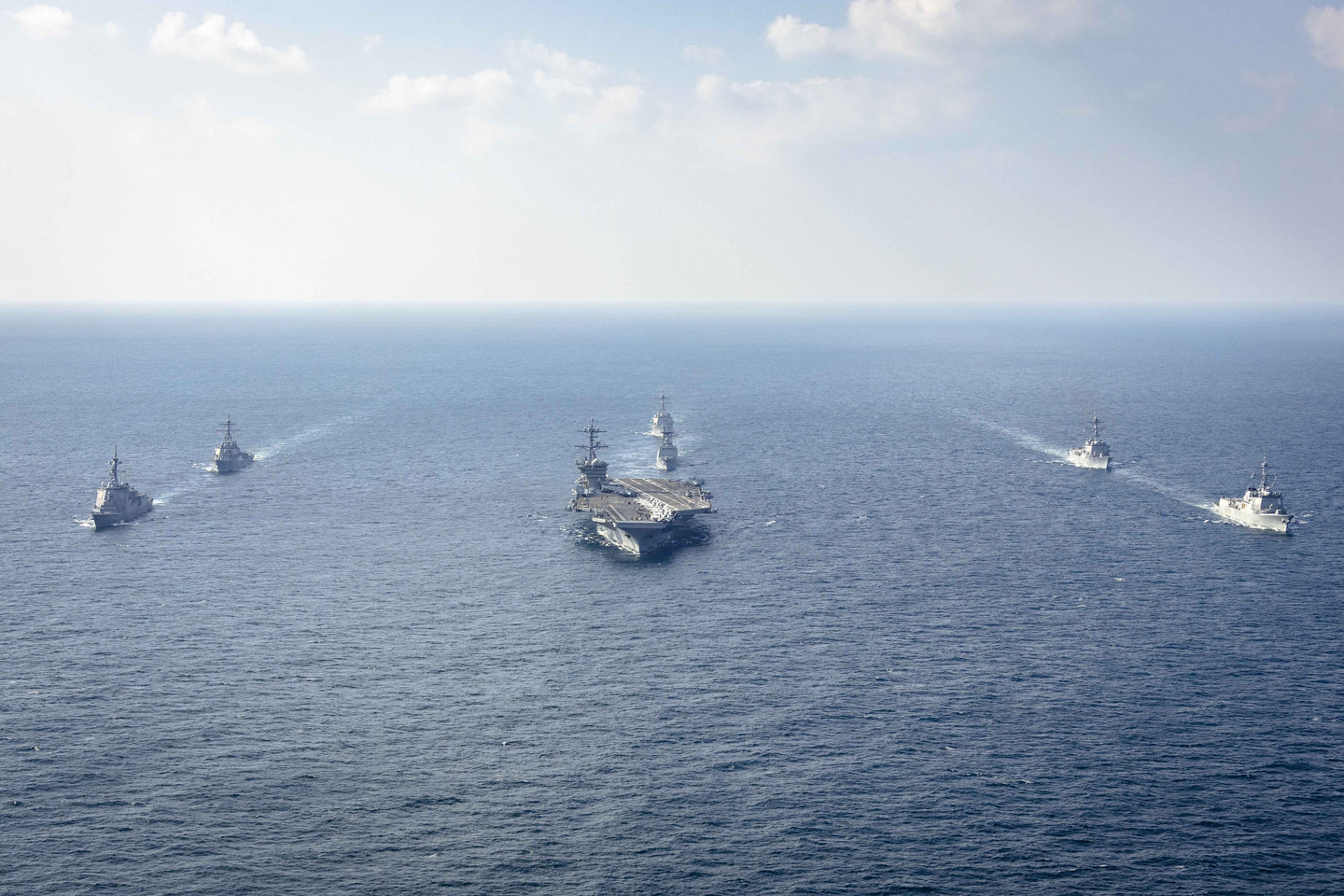 Warships of Korea, the United States and Japan including the USS George Washington aircraft carrier, bottom center, take part in the trilateral Freedom Edge exercise in international waters off Korea's southern island of Jeju on Nov. 13, 2024. [MINISTRY OF NATIONAL DEFENSE/AP/YONHAP]