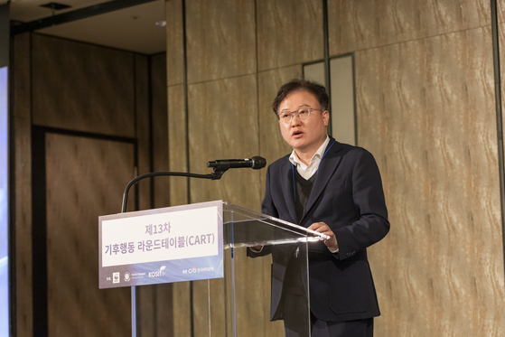 Citibank Korea Managing Director Kim Kyoung-ho speaks at the 13th Climate Action Roundtable (CART) held at the Four Seasons Hotel in central Seoul on April 15. [CITIBANK KOREA] 