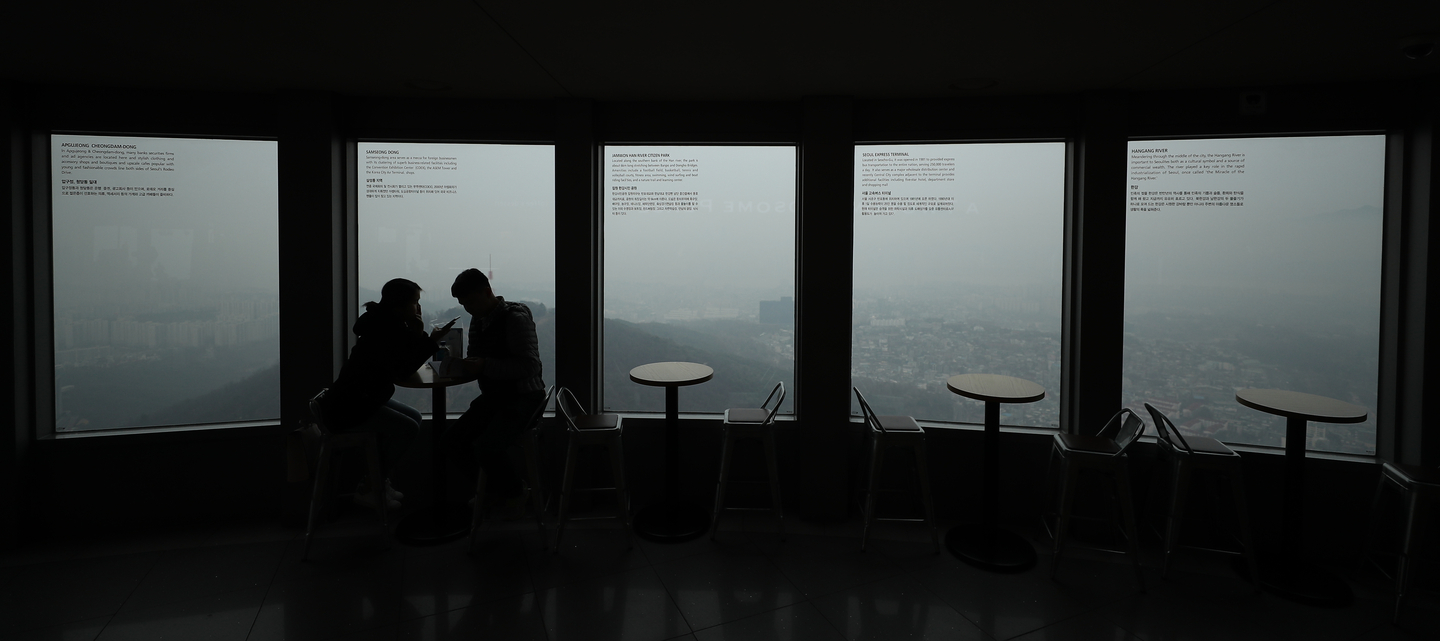 A couple enjoy a coffee date at the N Seoul Tower in Yongsan District, central Seoul, on March 20, 2019. [YONHAP]