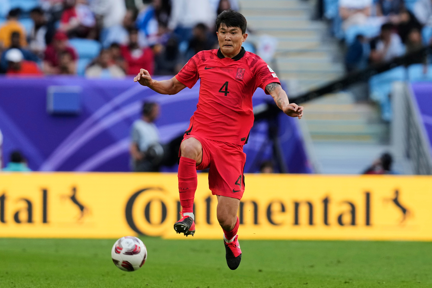 Korean footballer Kim Min-jae goes for the ball during the Asian Cup Group E soccer match between Korea and Malaysia at Al Janoub Stadium in Al Wakrah, Qatar, on Jan. 25, 2024. [AP PHOTO/YONHAP]