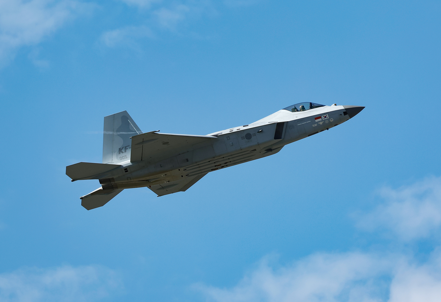 The KF-21 Boramae fighter jet flies across the sky near the Seoul Air Base in Seongnam, Gyeonggi, on Oct. 17, 2025. [YONHAP]