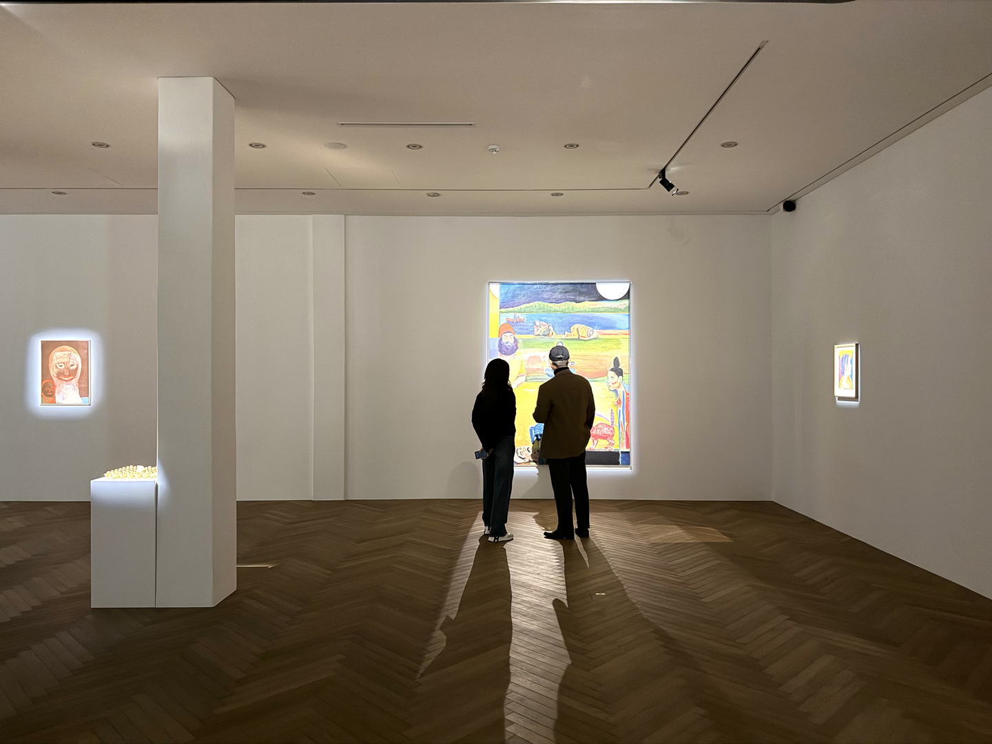 Two visitors observe an artwork in Heredium, an art gallery in Dong District, Daejeon. [HEREDIUM] 