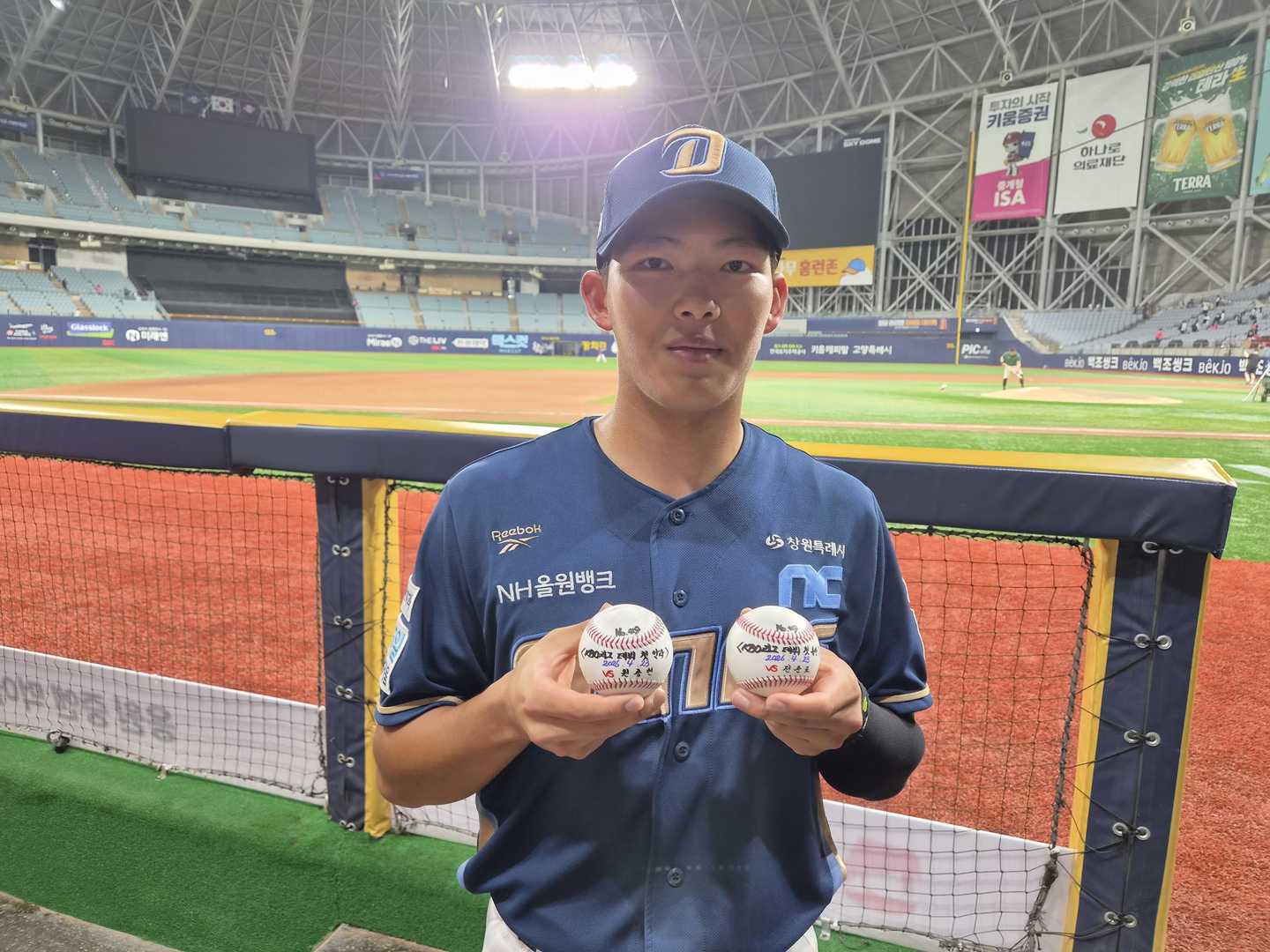 Ko Jun-hwi of the NC Dinos holds the balls for his first career hit in his right hand and first career home run in the KBO following a 12-2 win over the Kiwoom Heroes at Gocheok Sky Dome in Seoul on April 23. [YONHAP]