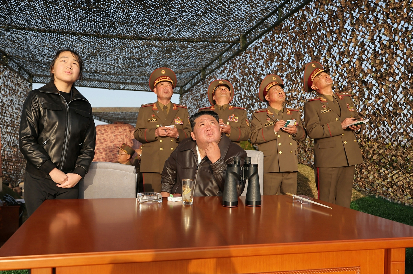 Kim Jong-un, second from left, and his daughter Kim Ju-ae, left, watch North Korea's Hwaseong-11 Ra surface-to-surface ballistic missile on April 19, in this photo released by North's official Rodong Sinmun the following day. [NEWS1] 