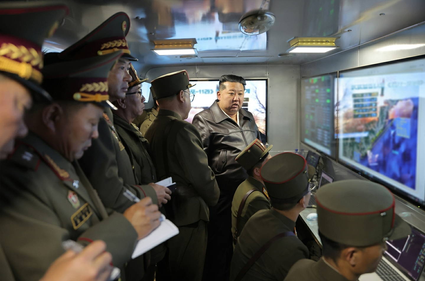 Kim Jong-un, top right, watches North Korea's Hwaseong-11 Ra surface-to-surface ballistic missile on April 19, in this photo released by North's official Rodong Sinmun the following day. [NEWS1] 