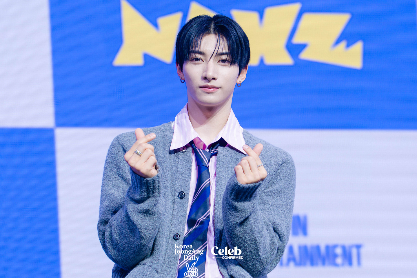 NEXZ’s Yu poses for photos during a showcase for the release of the group’s second single “Mmchk” at Blue Square in central Seoul on April 27. [DANIELA GONZALEZ PEREZ]