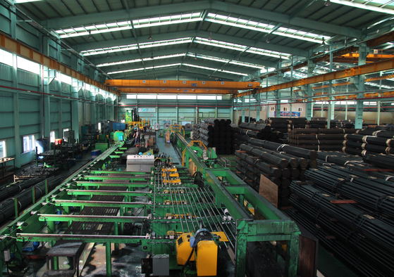 Exports are piled up in the plant of TGSPipe, a company that participated in financial aid program run by Posco and the Industrial Bank of Korea. [POSCO]
