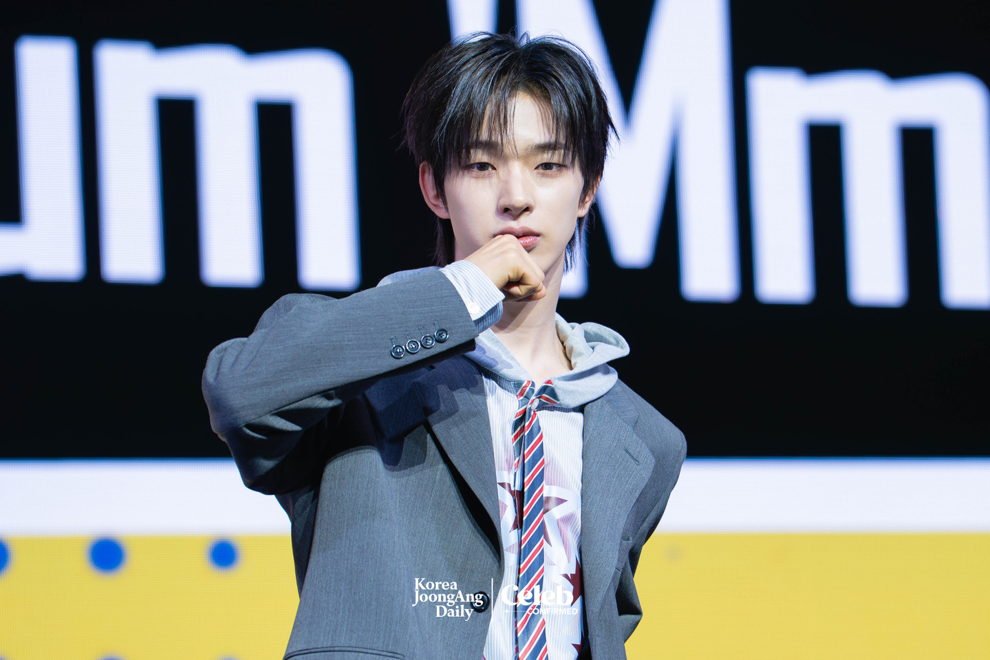 NEXZ’s Tomoya poses for photos during a showcase for the release of the group’s second single “Mmchk” at Blue Square in central Seoul on April 27. [DANIELA GONZALEZ PEREZ]