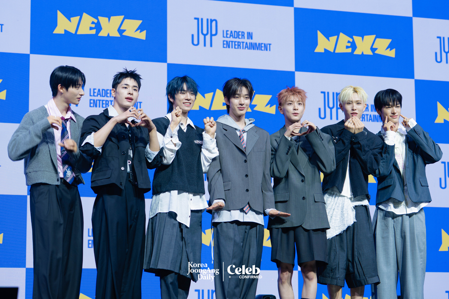 Boy band NEXZ poses for photos during a showcase for the release of its second single “Mmchk” at Blue Square in central Seoul on April 27. [DANIELA GONZALEZ PEREZ]