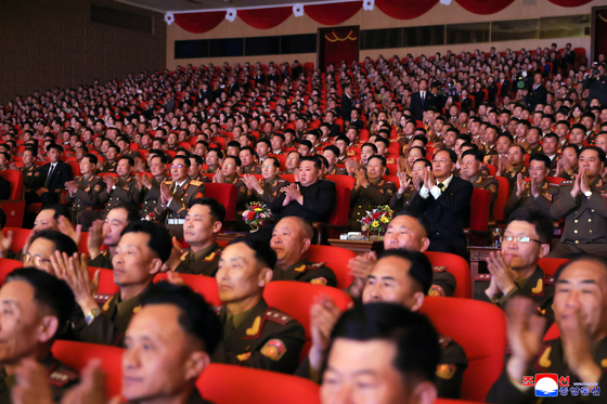 North Korean leader Kim Jong-un, center, attends a concert marking the 80th founding anniversary of a key military band in this photo released by the Korean Central News Agency on April 29. [YONHAP] 