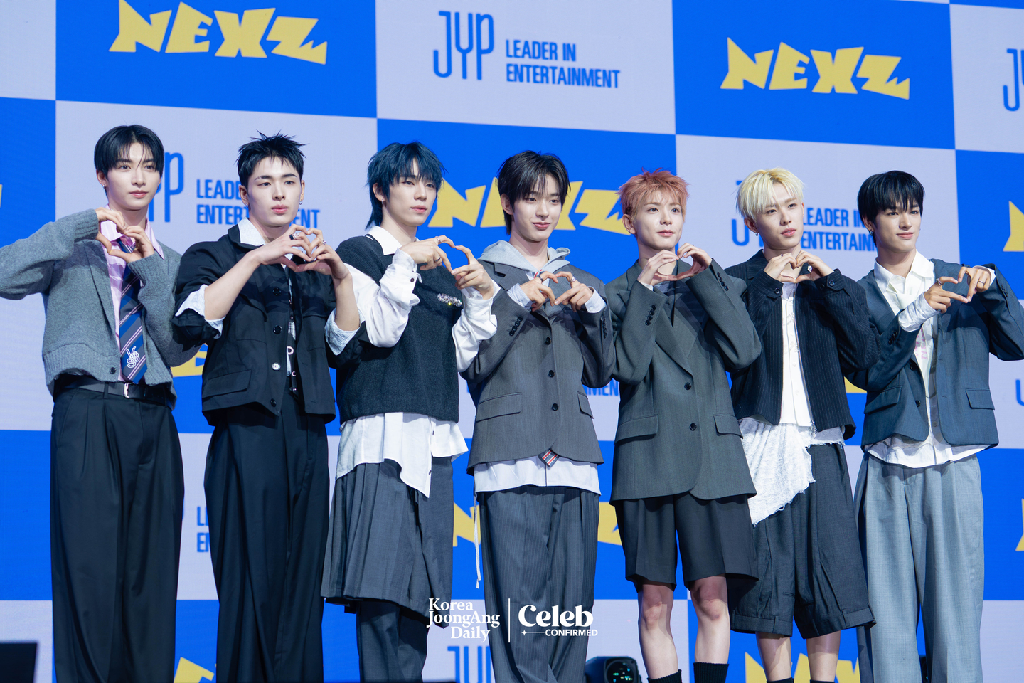 Boy band NEXZ poses for photos during a showcase for the release of its second single “Mmchk” at Blue Square in central Seoul on April 27. [DANIELA GONZALEZ PEREZ]
