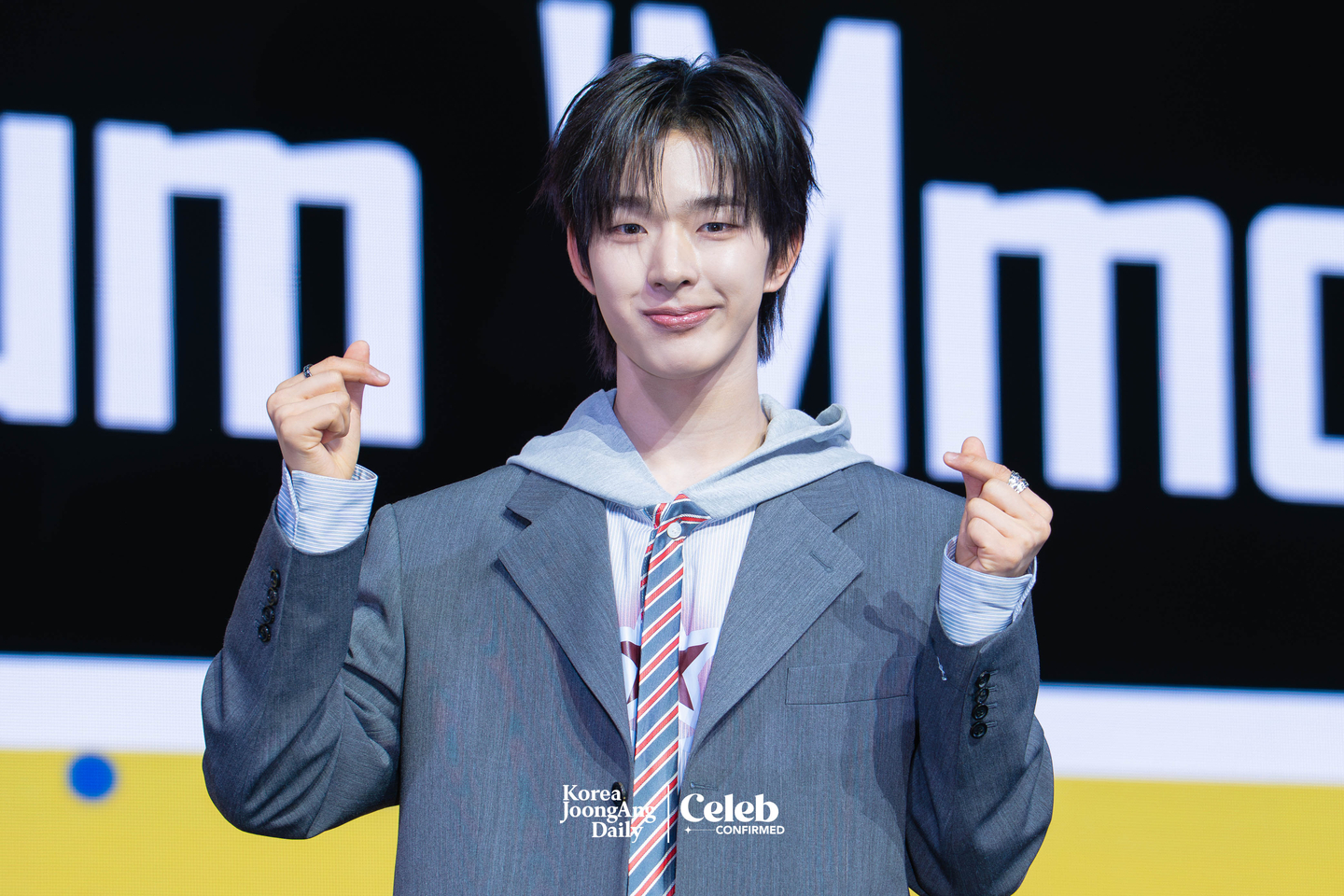 NEXZ’s Tomoya poses for photos during a showcase for the release of the group’s second single “Mmchk” at Blue Square in central Seoul on April 27. [DANIELA GONZALEZ PEREZ]